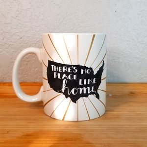 Cream Coffee Mug with "There's No Place Like Home" by Designs by Kathy
